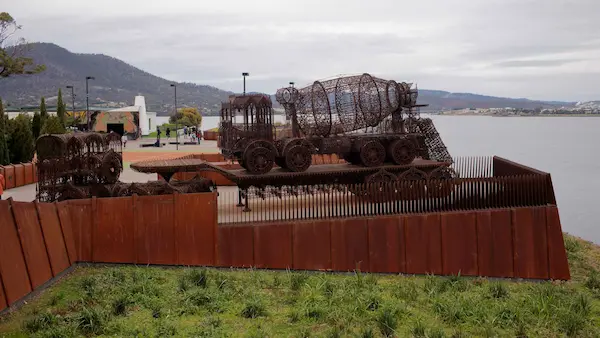 Flatbed Truck, Trailer and Cement Truck (Wim Delvoye)